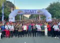 Rayakan HUT Bhayangkara ke-80 di Balikpapan, Warga Berebut Hadiah Umrah dan Motor